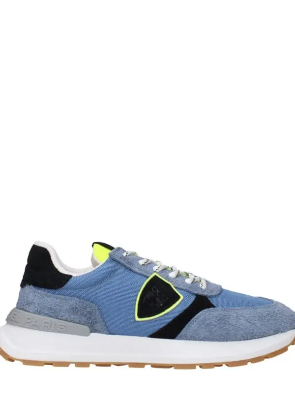 Bright blue and grey sneaker with black and neon yellow accents, mesh and suede materials, and a comfortable white midsole for stylish casual wear.