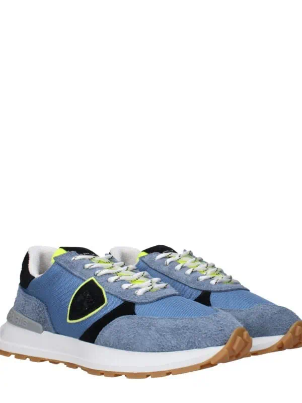 Blue and gray athletic sneakers with neon accents, suede and mesh material, comfortable sole, perfect for casual wear and athletic activities.