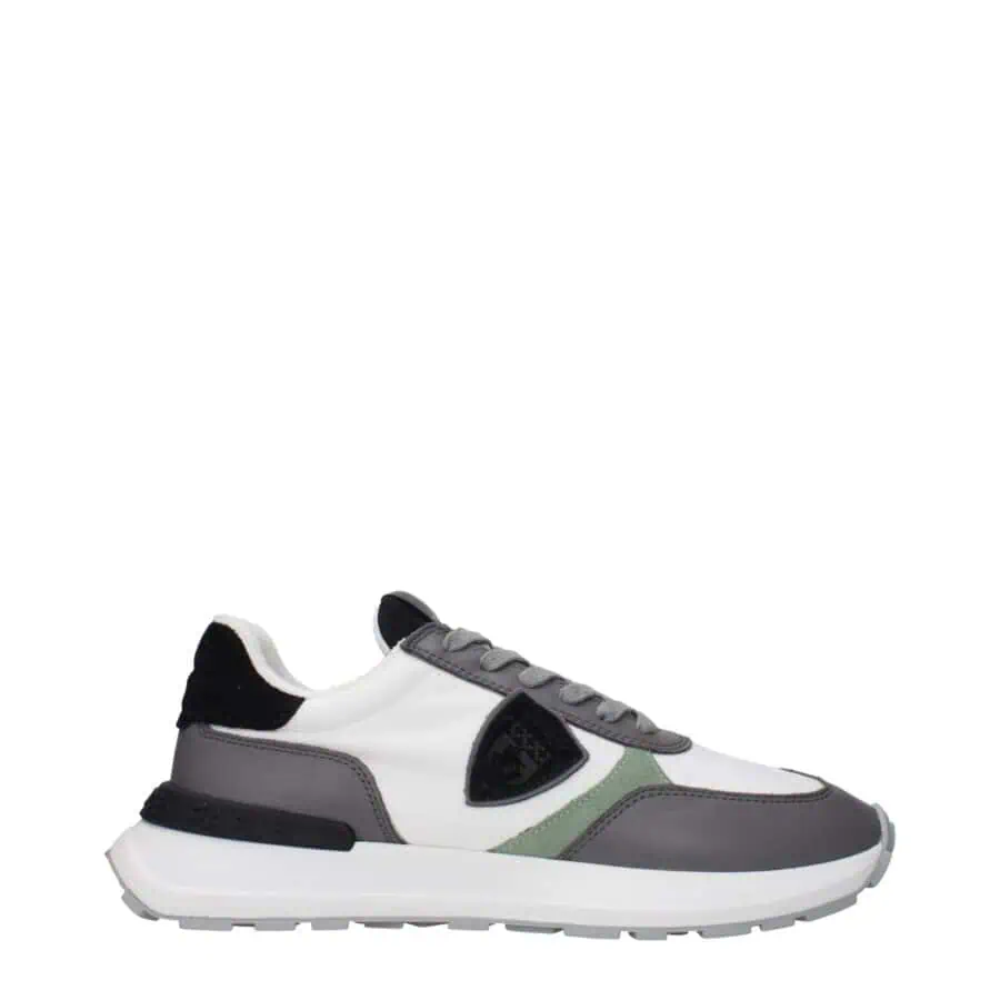 Stylish designer sneakers with a mix of white, gray, black, and green accents, lightweight and comfortable, perfect for Casual and streetwear fashion.