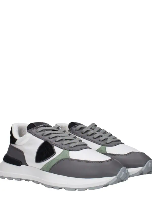 Luxurious men's trendy casual sneakers with gray, white, black, and green accents, designed for comfort and style. Perfect for everyday wear and fashion-forward outfits.