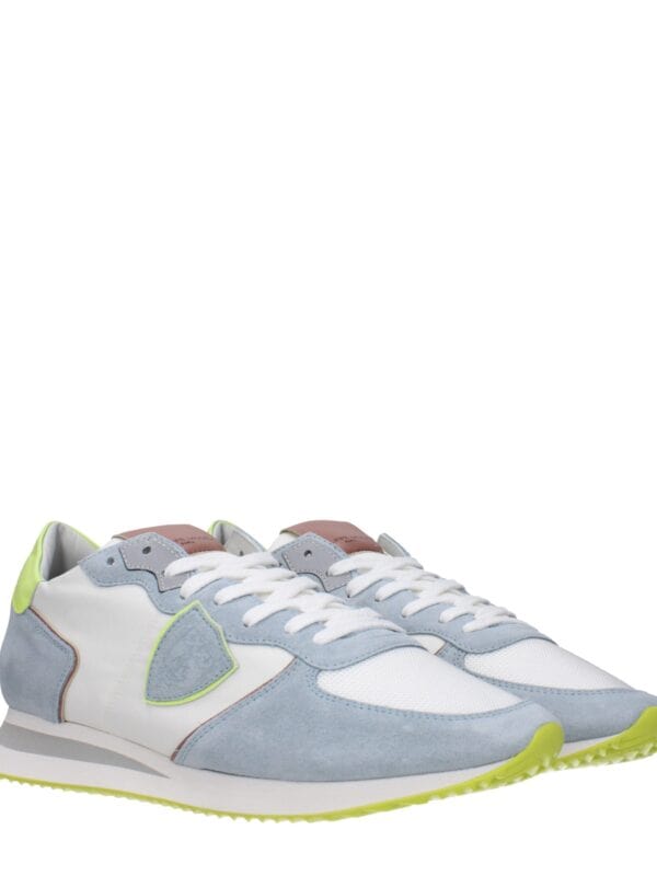 1. Men's luxury sneakers with white, grey, and neon accents, stylishly designed for comfort and high-end fashion.