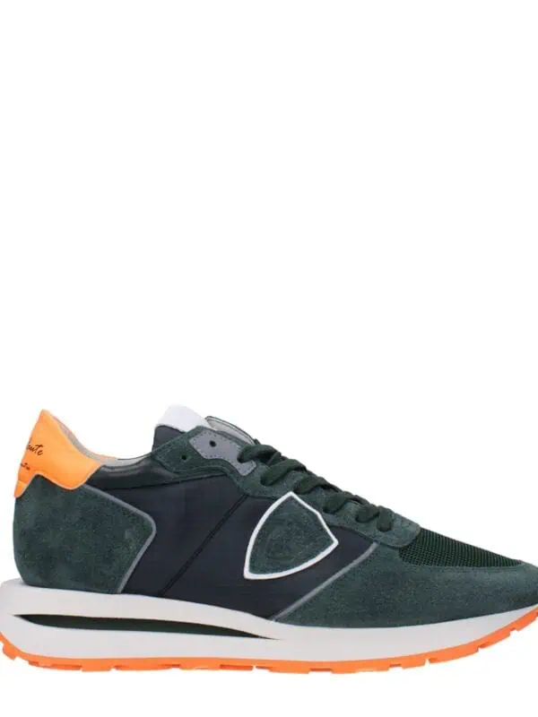 Premium designer sneaker in dark green with orange accents, breathable mesh, and cushioned sole for stylish comfort and athletic performance. Perfect for casual or sporty looks.