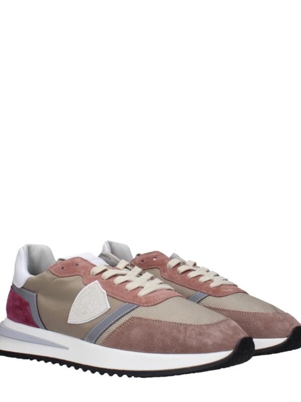 Stylish beige and pink designer sneakers with white and gray accents, featuring a comfortable sole and trendy design, perfect for casual and athletic wear.