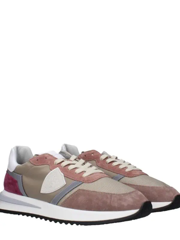 Stylish beige and pink designer sneakers with white and gray accents, featuring a comfortable sole and trendy design, perfect for casual and athletic wear.