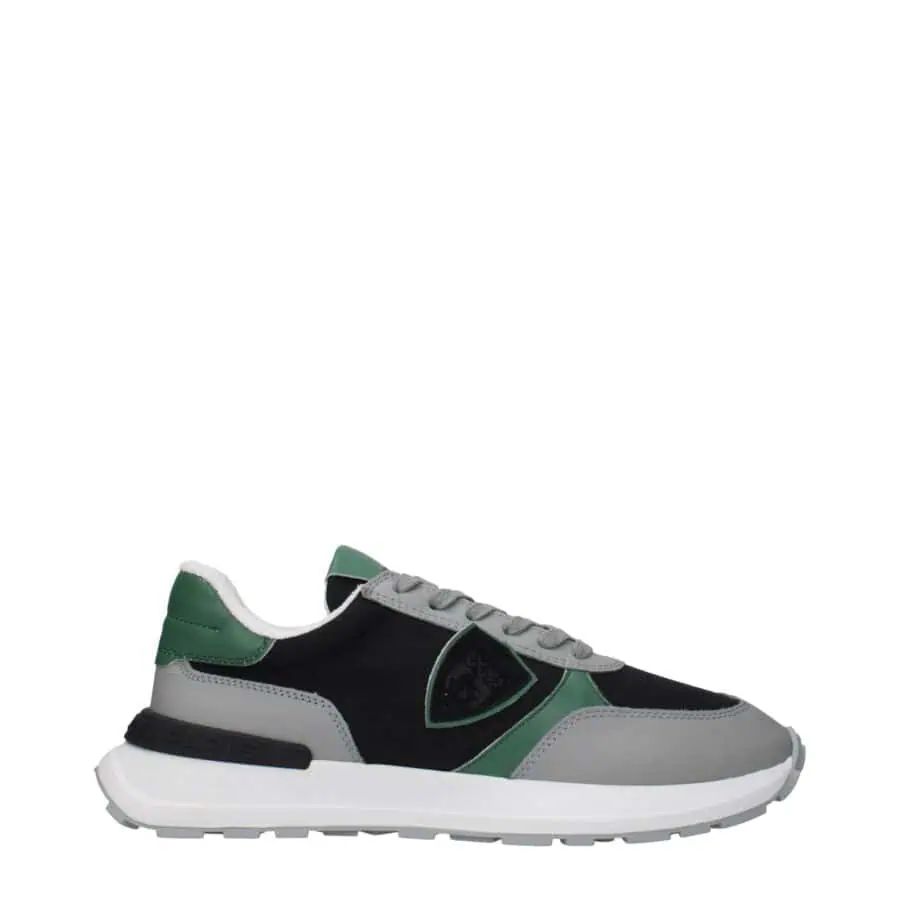 Stylish men's sneakers with black, gray, and green accents, cushioned sole, and breathable design for casual comfort and trendy look. Perfect for everyday wear.