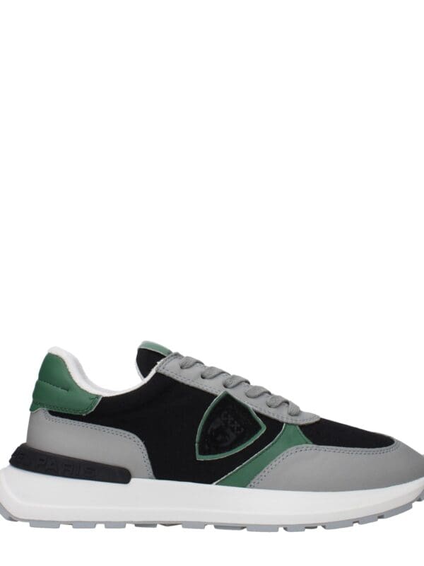 Luxurious men's trendy sneakers with black, grey, and green color accents, featuring comfortable design and durable sole for casual and stylish wear.
