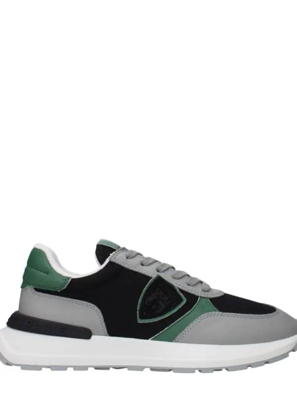 Luxurious men's trendy sneakers with black, grey, and green color accents, featuring comfortable design and durable sole for casual and stylish wear.