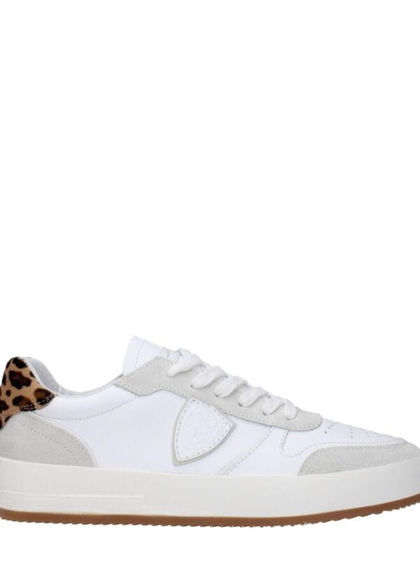 Lux white sneaker with leopard print heel detail, casual design, and comfortable sole for everyday wear. Perfect fusion of luxury and style for modern fashion enthusiasts.