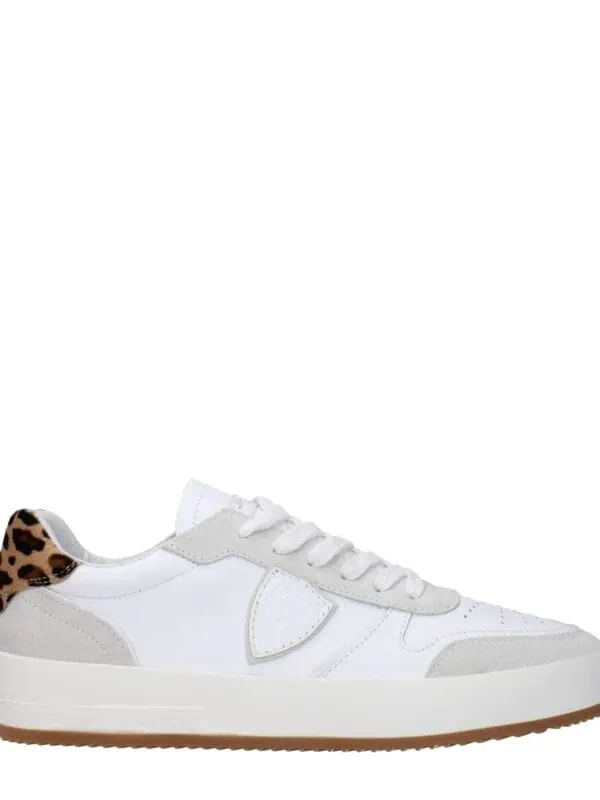 Lux white sneaker with leopard print heel detail, casual design, and comfortable sole for everyday wear. Perfect fusion of luxury and style for modern fashion enthusiasts.