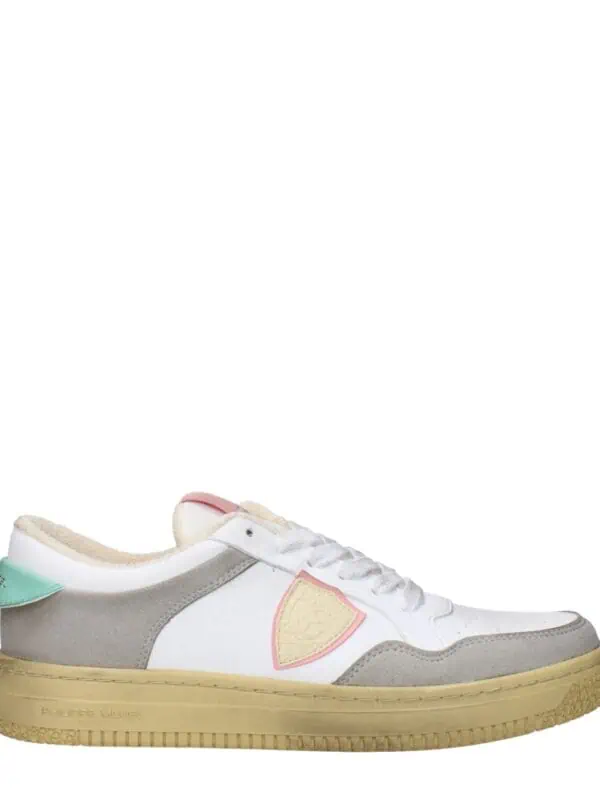 Stylish women's casual sneakers with white, beige, pink, and mint accents, featuring comfortable design and trendy look for everyday wear.