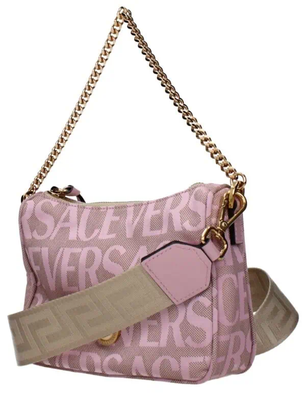 Pink Versace designer handbag with chain strap and adjustable beige logo strap, stylish accessory for luxury fashion.