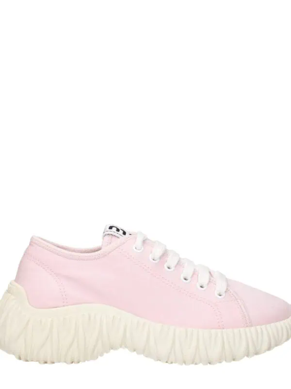 Pink canvas sneaker with chunky textured off-white sole, lace-up closure, and casual style for comfortable daytime wear.