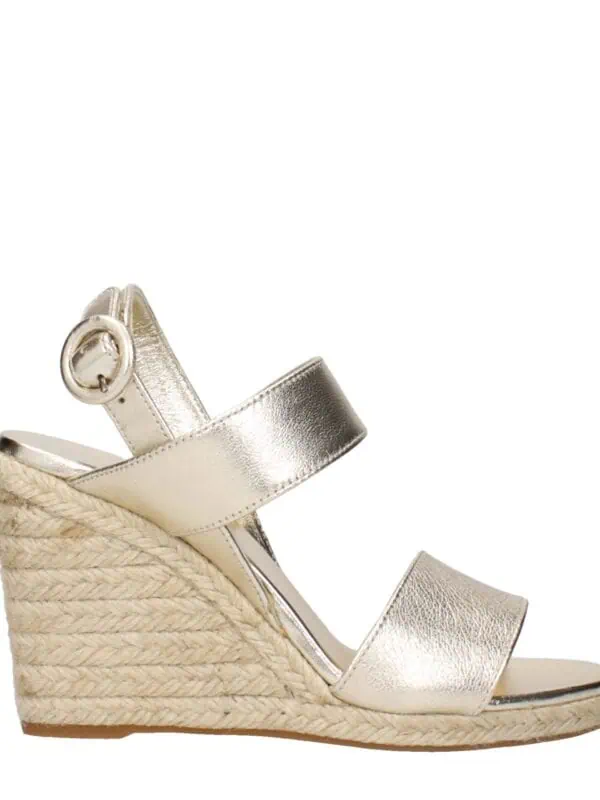 Gold metallic espadrille wedge sandal with ankle strap and buckle closure, perfect for summer or casual stylish outfits.