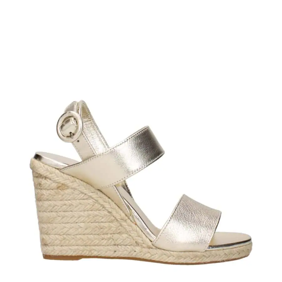 Gold metallic espadrille wedge sandal with ankle strap and buckle closure, perfect for summer or casual stylish outfits.