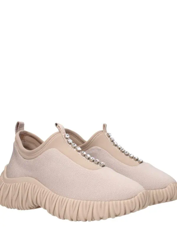 Comfy beige slip-on sneakers with rhinestone embellishments, trendy casual footwear for women.