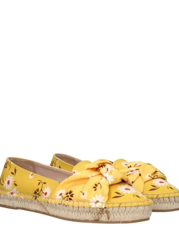 Yellow floral espadrille flats with oversized bow detail for women, casual slip-on shoes perfect for summer, stylish and comfortable footwear from Lux Brands.