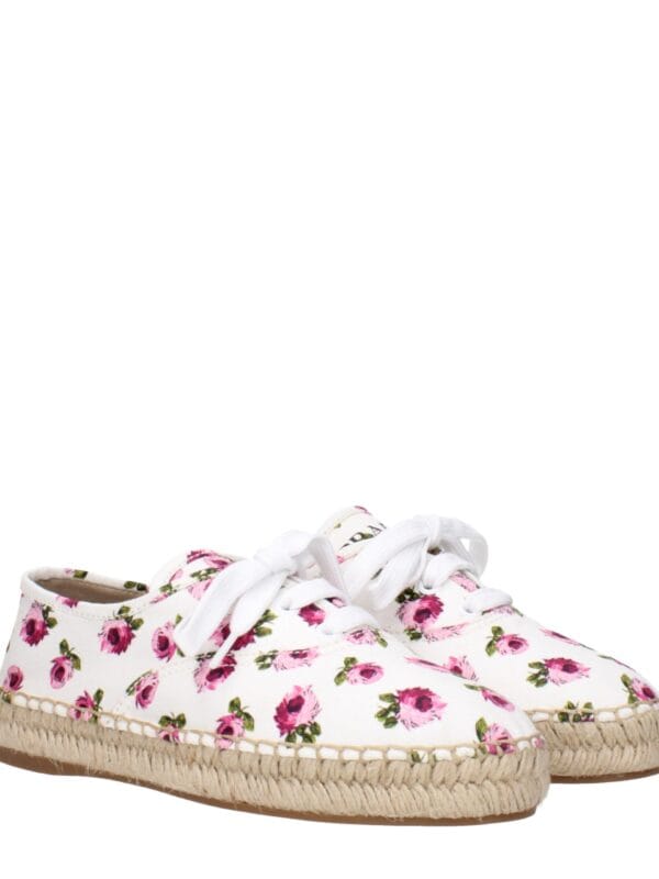 Floral print espadrille sneakers with white laces and woven jute soles, perfect for casual summer wear and chic, comfortable style.