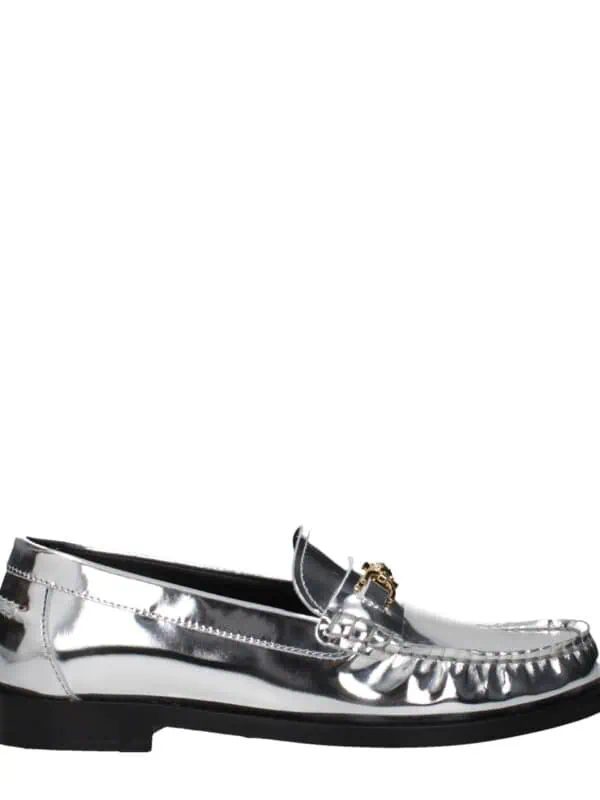 Shiny metallic silver loafer with a decorative gold buckle and ruffle detailing, stylish and elegant footwear for men or women.