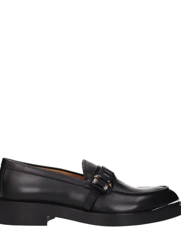 Black leather Dior loafers with a sleek buckle detail and comfortable sole for luxury fashion and style.