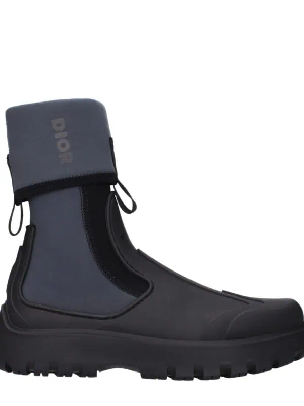 Waterproof men's winter boots with durable rubber soles, neoprene uppers, and adjustable ankle straps for ultimate warmth and protection in cold, snowy conditions.