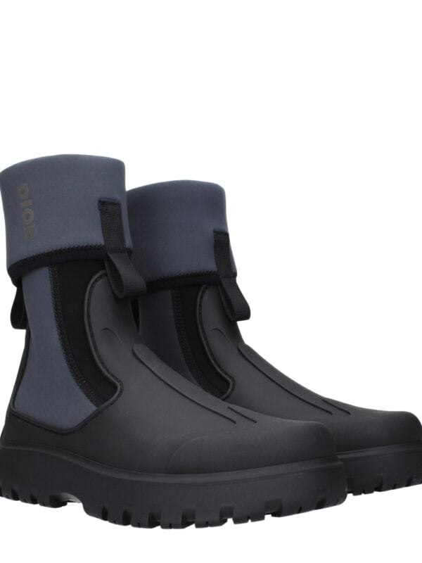 Waterproof designer rain boots with adjustable straps, flexible soles, and premium materials for urban fashion and weather protection. Perfect for rainy days and stylish outings.