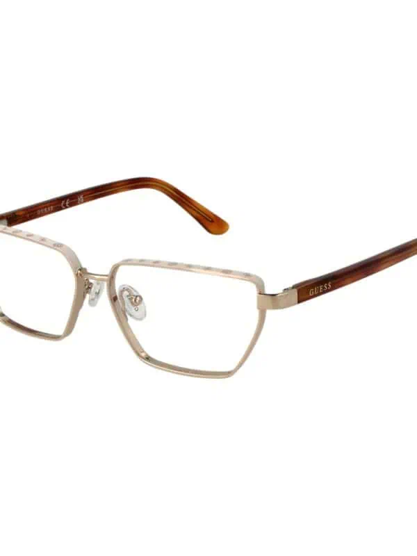 Elegant Guess eyeglasses with a clear metal frame and tortoiseshell temples, perfect for a sophisticated and stylish look.