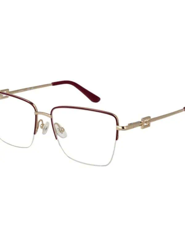 Elegant designer eyeglasses with gold metal frame and red accents for a sophisticated look. Perfect for stylish eyewear fashion.