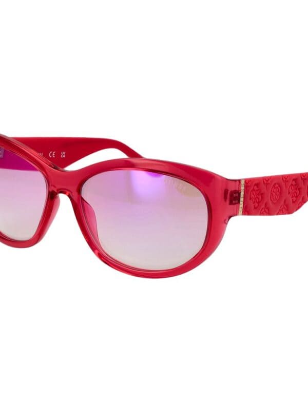 Red fashionable designer sunglasses with purple-tinted lenses for women.