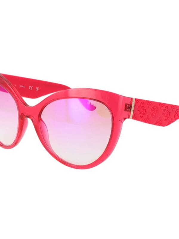 Pink designer sunglasses with pink tinted lenses and textured arms, stylish and trendy.