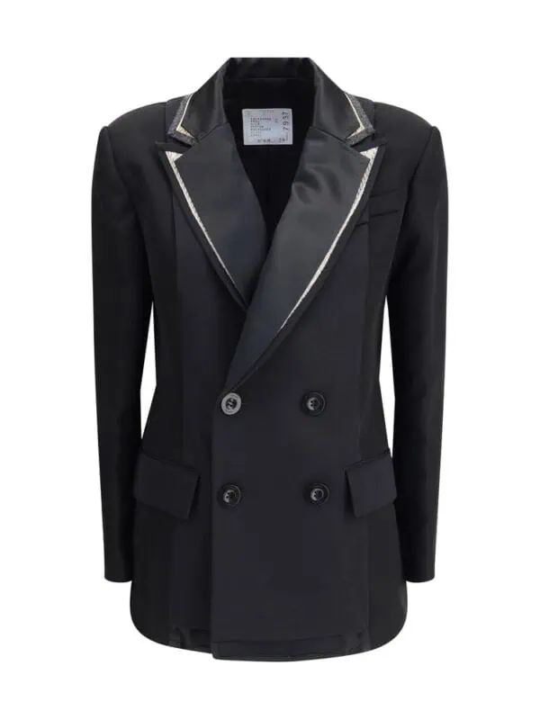 Black double-breasted blazer with satin lapels and decorative silver piping, tailored for a sophisticated and stylish look. Perfect for formal and fashion-forward occasions.