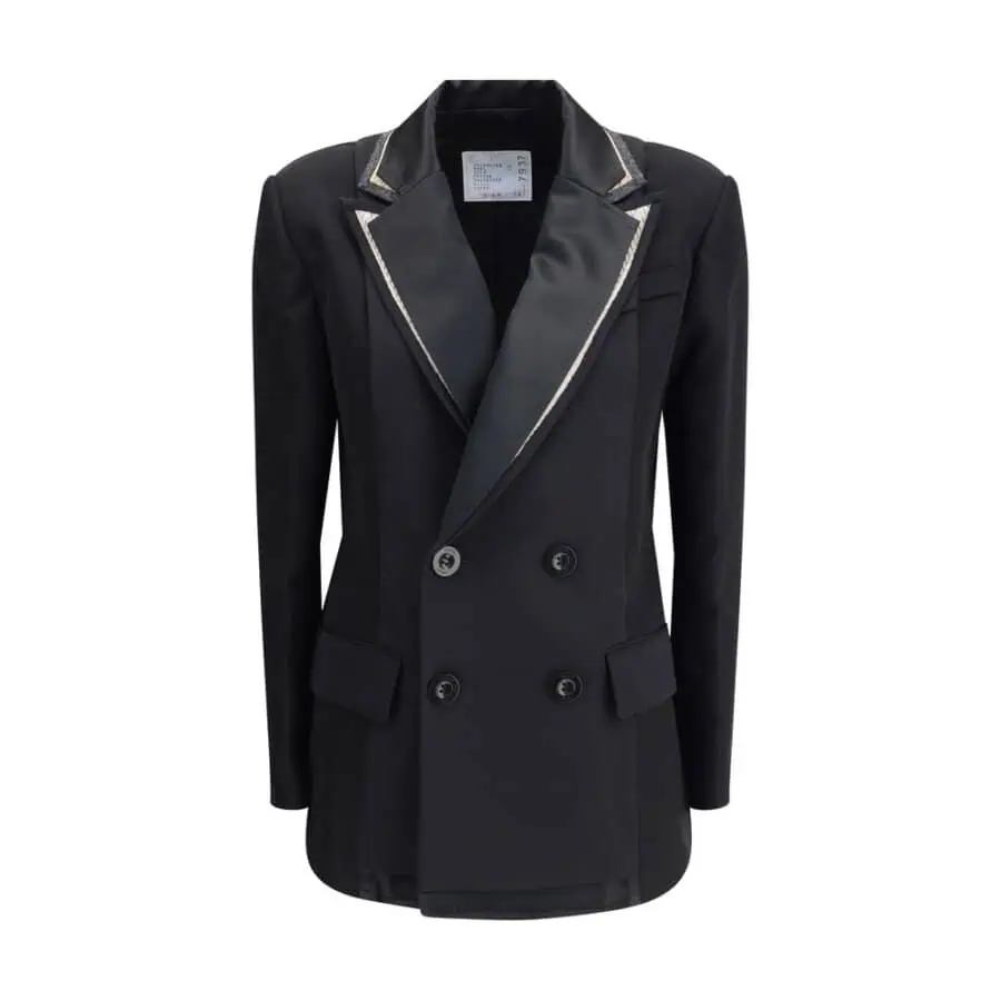 Black double-breasted blazer with satin lapels and decorative silver piping, tailored for a sophisticated and stylish look. Perfect for formal and fashion-forward occasions.