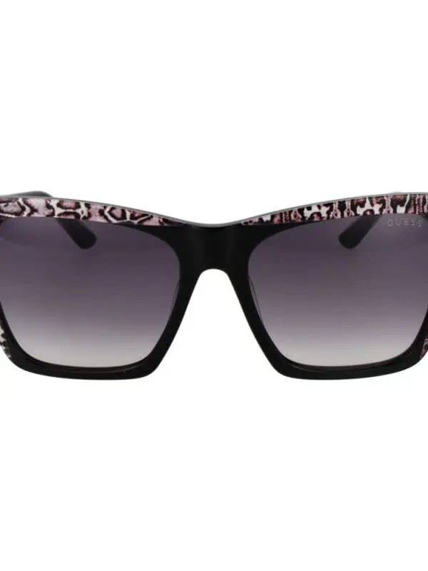 Black and pink animal print sunglasses with tinted lenses from Guess.