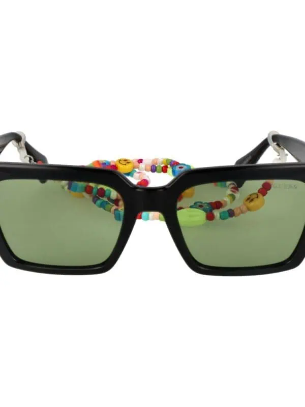 Bold black oversized sunglasses with green tinted lenses and colorful beaded chain. Perfect for a trendy, vibrant summer look.