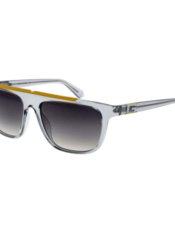 Sunglasses with black gradient lenses, white and yellow frame, modern design for stylish sun protection.