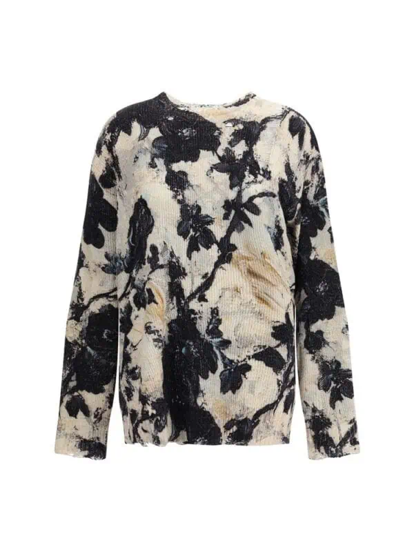 Black and cream abstract floral sweater with textured knit and relaxed fit, perfect for stylish casual wear.