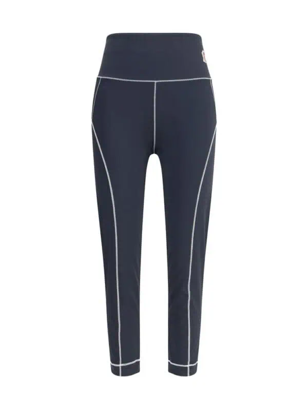 High-waisted athletic leggings with white piping, designed for yoga, running, and fitness activities, providing comfort and style for active women.