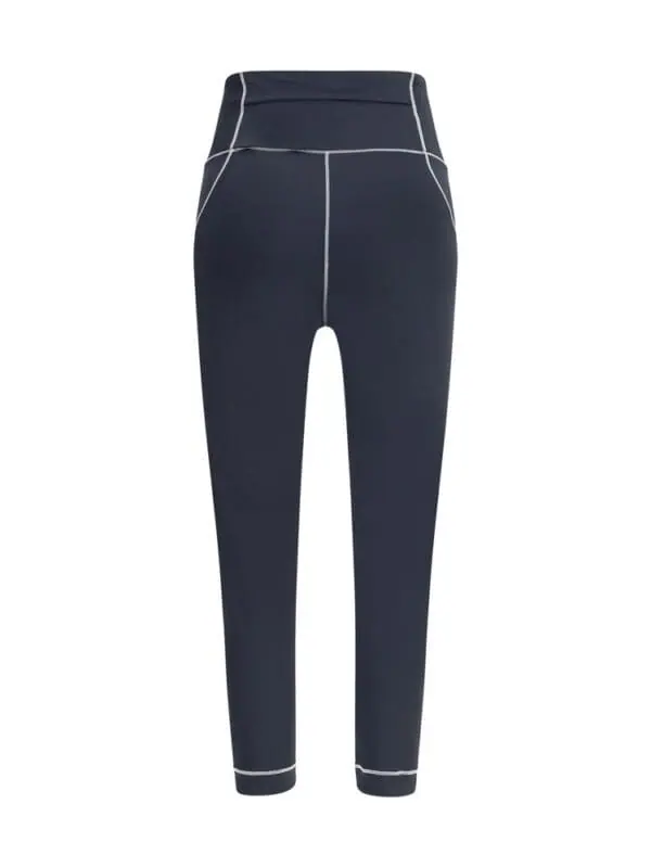 High-waisted black athletic leggings with contrasting white piping, designed for activewear and stylish workouts. Perfect for fitness, yoga, and casual wear.