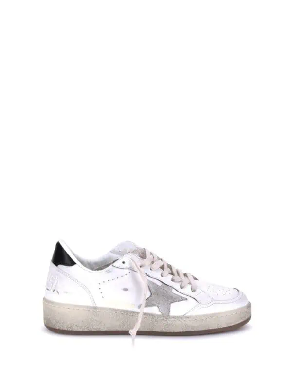 White leather sneaker with grey star logo, stylish and comfortable casual shoe for everyday wear.