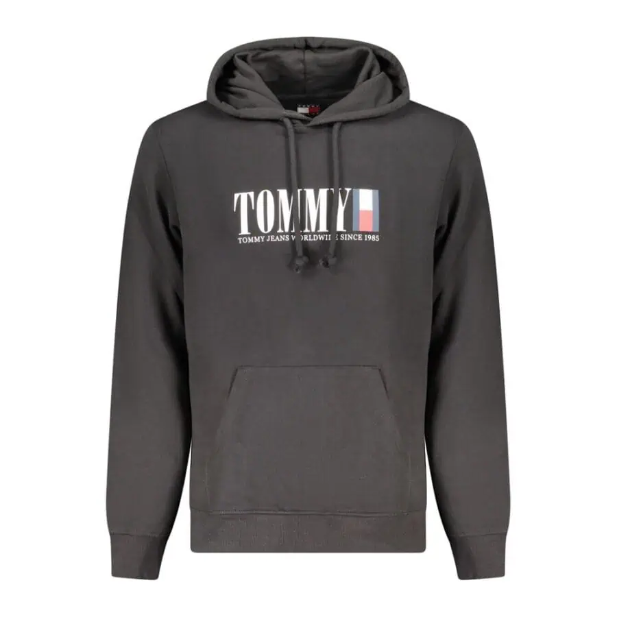 Soft black Tommy Jeans hoodie with logo print, drawstring hood, kangaroo pocket, and comfortable ribbed cuffs and hem. Perfect for casual and streetwear styles.
