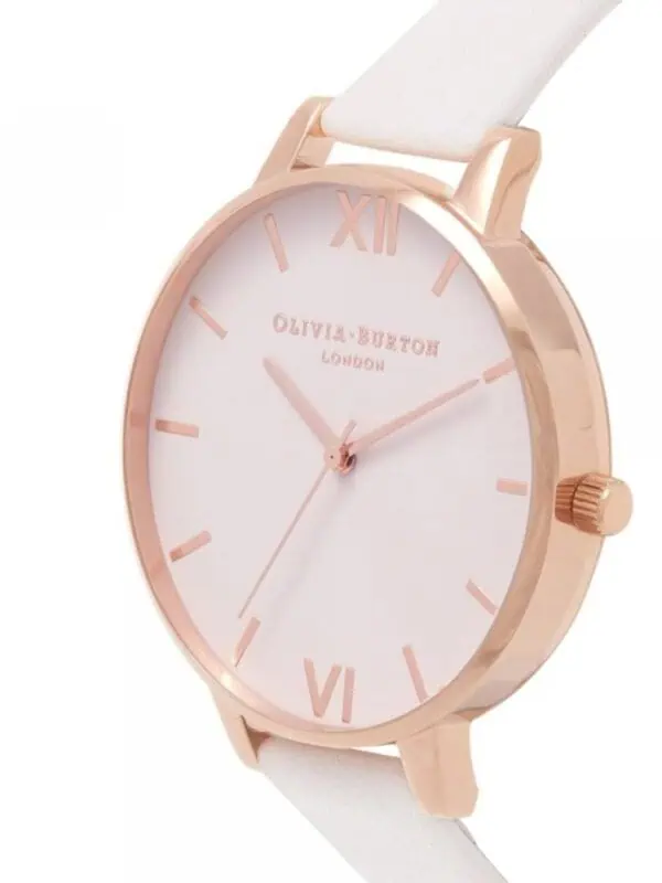 Rose gold watch with white dial, minimalist design, and white strap from Lux Brands.