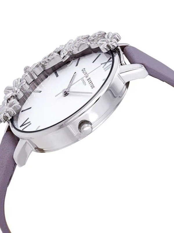 Elegant silver wristwatch with floral embellishments and a lavender strap, perfect for women's fashion accessories.
