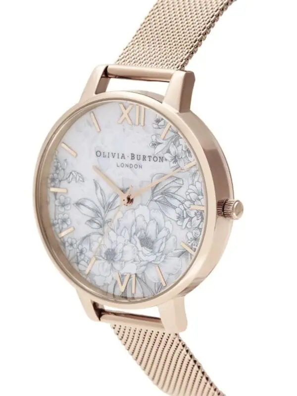 Elegant rose gold-tone women's watch with a floral dial, featuring Roman numerals, quartz movement, and a mesh strap for a sophisticated, feminine accessory.