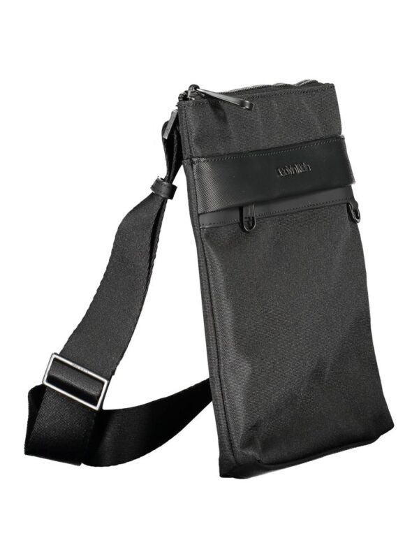Black crossbody bag made of durable fabric with multiple compartments and adjustable strap, perfect for everyday use and travel.