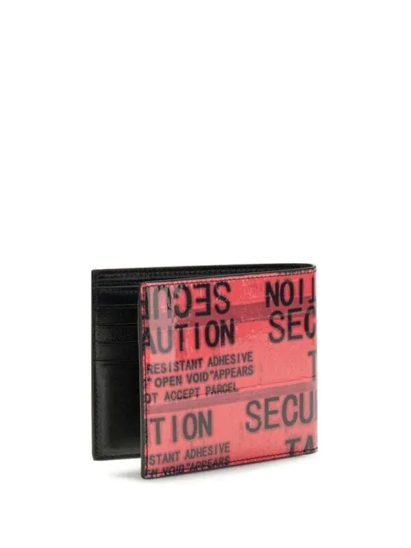 High-end designer wallet with bold emergency tape design, combining luxury leather with attention-grabbing style. Perfect for fashion-forward individuals seeking unique accessories.
