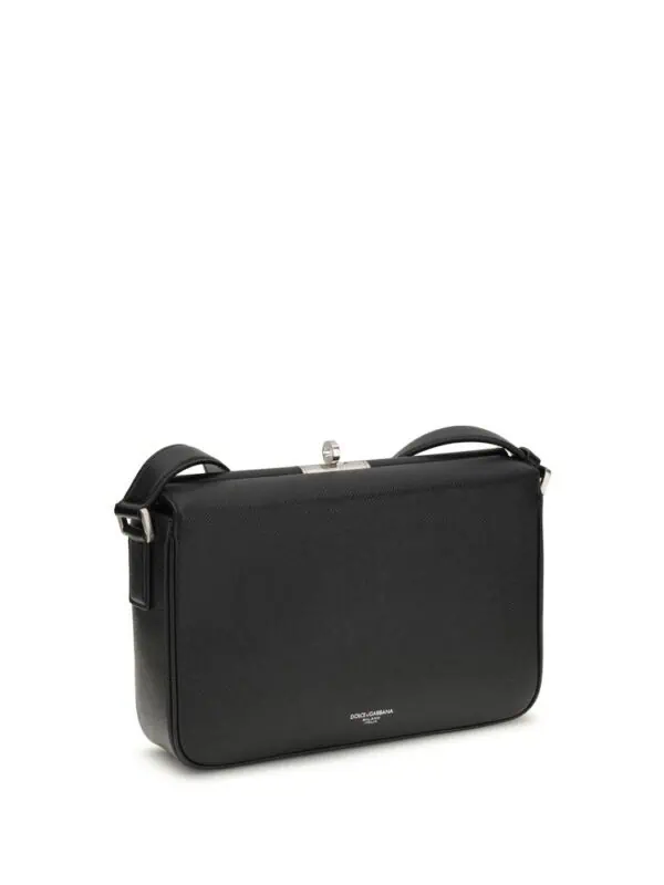 Black Dolce & Gabbana designer leather shoulder bag with silver hardware and minimalist style.