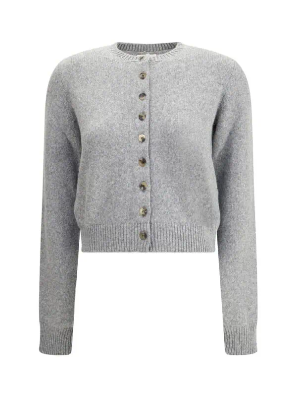 Soft grey cashmere cardigan with button closure, perfect for elegant winter outfits.