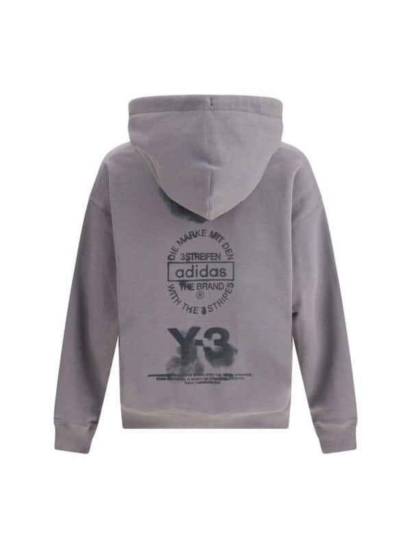Adidas Y-3 grey hoodie with graphic logo print on the back, casual streetwear style, Made for comfort and trendy urban fashion.