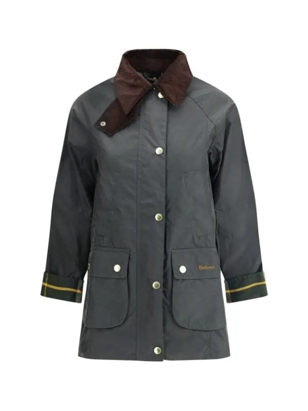 Vintage Barbour waxed jacket with corduroy collar and multiple front pockets for outdoor style and durability.