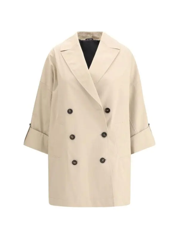 Beige oversized double-breasted trench coat with wide lapels and rolled-up sleeves, perfect for stylish layering.