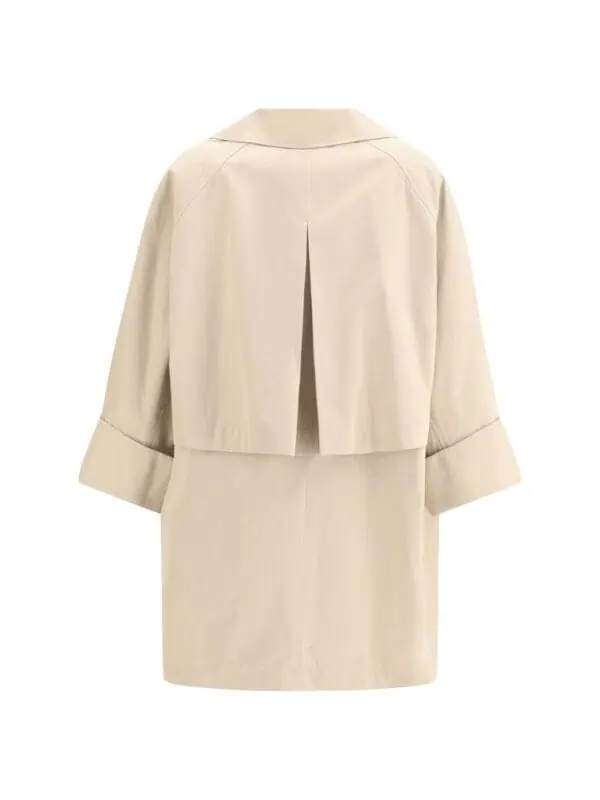 Lux Brands - Elegant beige oversized blazer with a back pleat and wide sleeve cuffs, perfect for sophisticated casual or formal wear. Made from high-quality fabric for a luxurious feel.